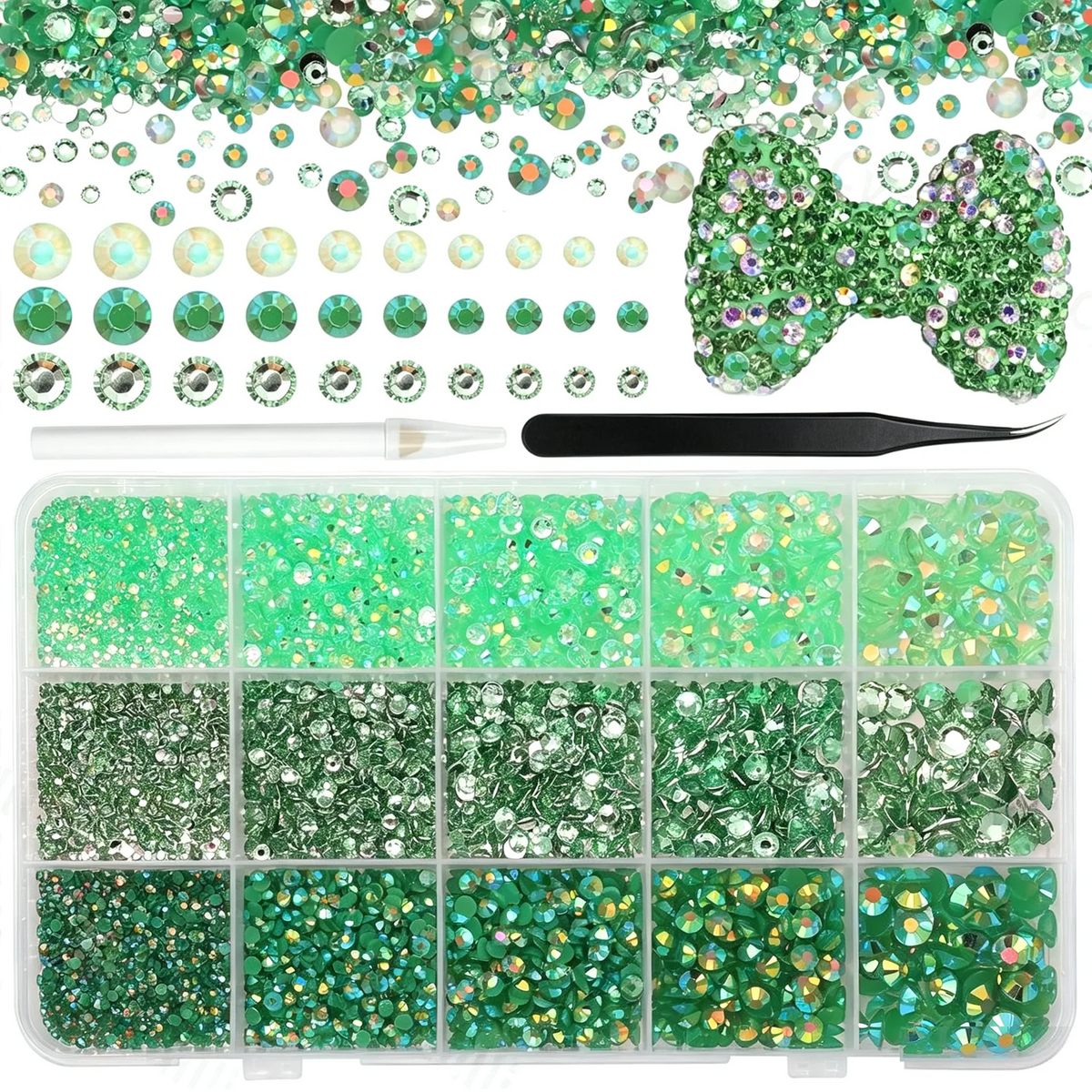 A collection of flatback resin rhinestones in various shades of green and gold, including loose stones and a storage tray.
