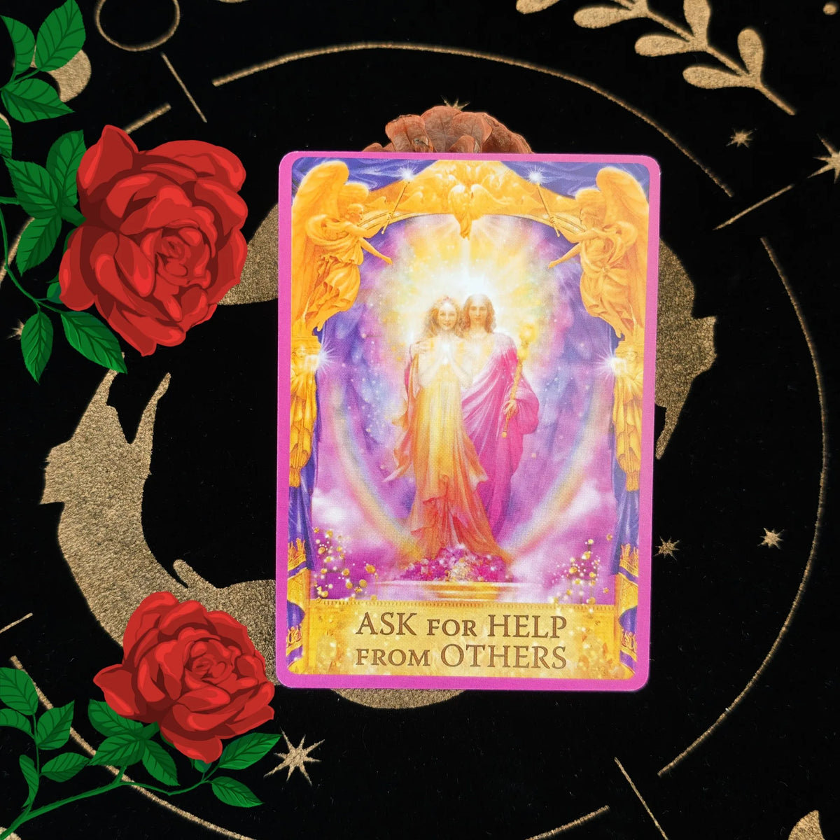 A tarot card featuring two figures in a radiant light framed by golden wings and purple hues, asking for help from others.
