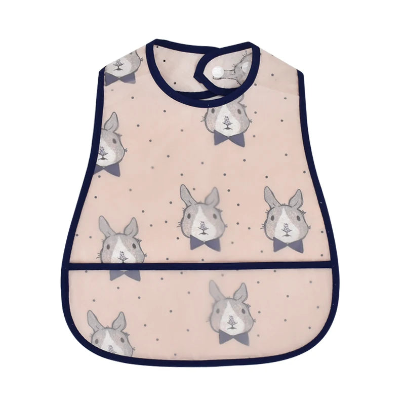 A light pink baby bib featuring a repeating cartoon rabbit pattern with gray and white accents.