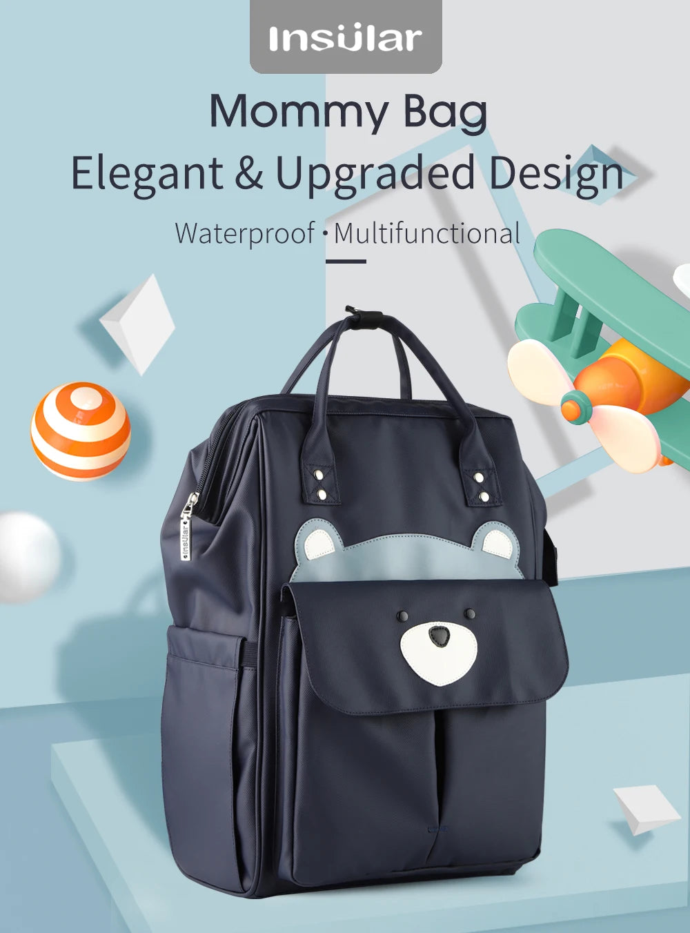 A navy blue Insular Mommy Bag backpack featuring a bear design and storage pockets.