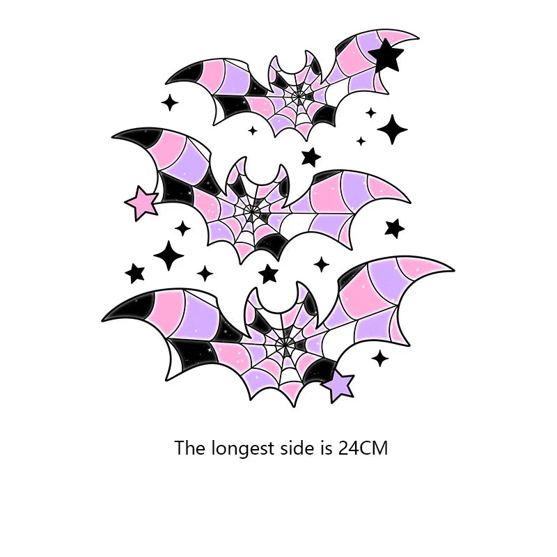 A purple and pink bat silhouette with a spiderweb design on a white background.