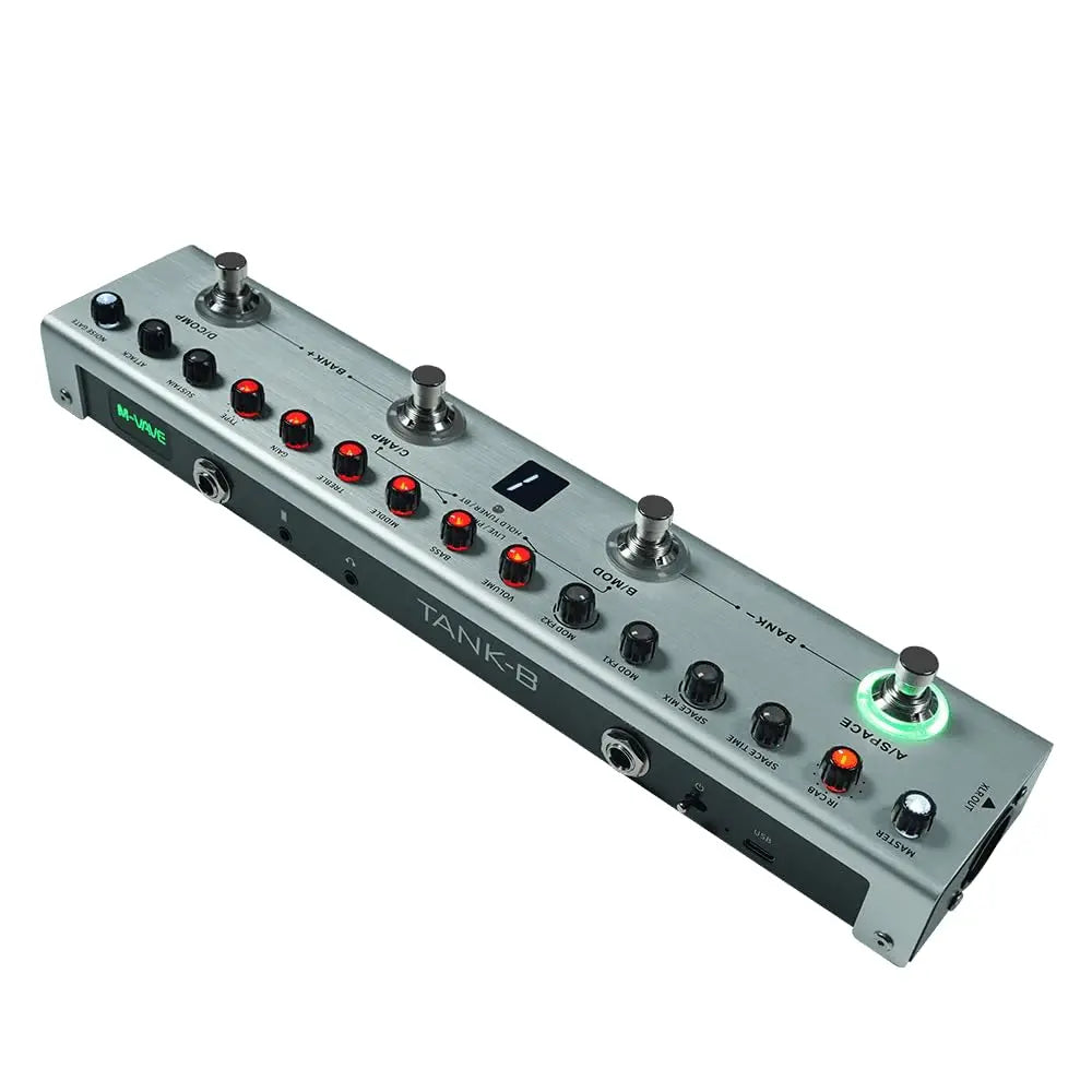 A silver portable guitar multi-effects processor with various knobs and controls.