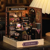 A detailed miniature dollhouse puzzle kit featuring a brick facade and various magical items like potions and artifacts.