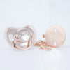 Rose gold rhinestone pacifier and clip set with a chain