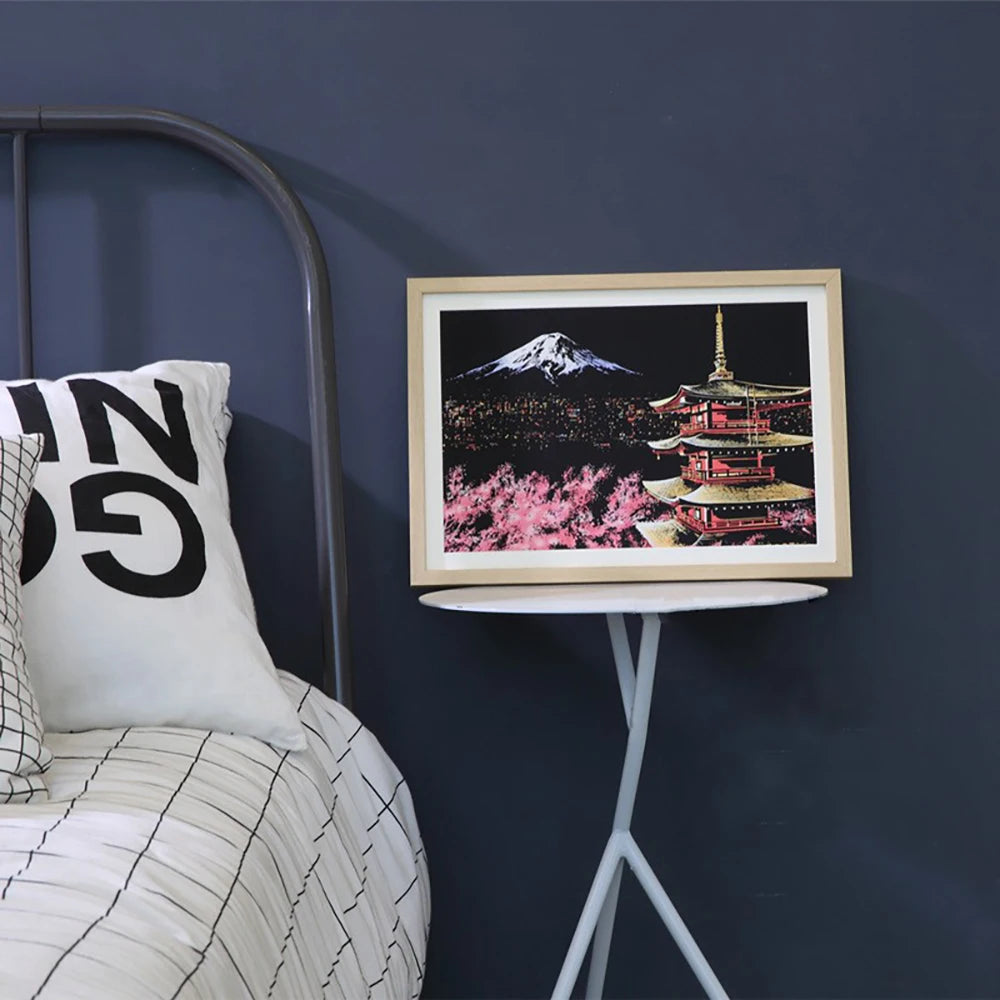Framed art print depicting Mount Fuji and a traditional Japanese pagoda against a dark landscape