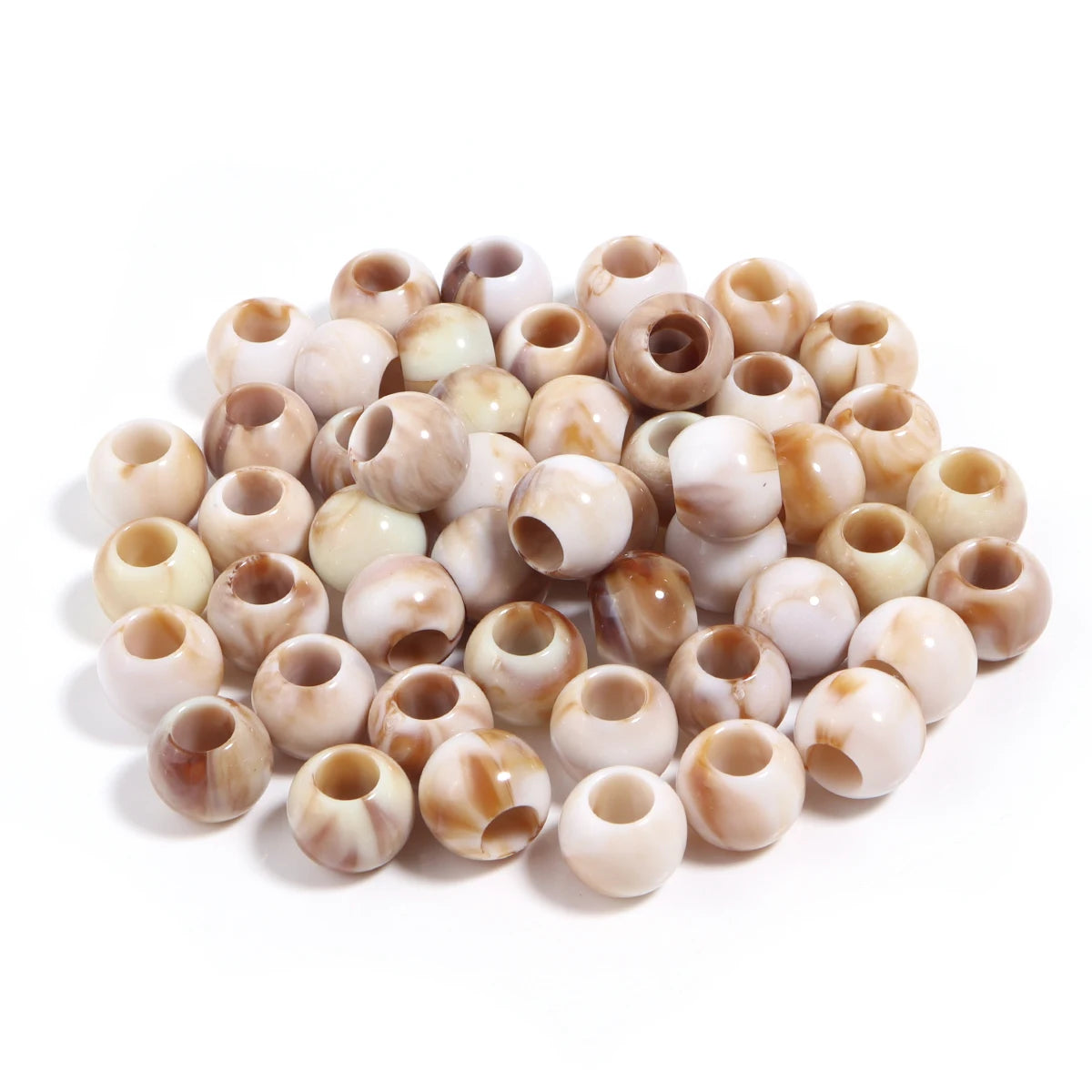 A pile of 50 imitation jade acrylic cloud beads in various natural and milky white shades for jewelry making.
