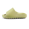A light green EVA platform slide with a textured sole for beach or home use.