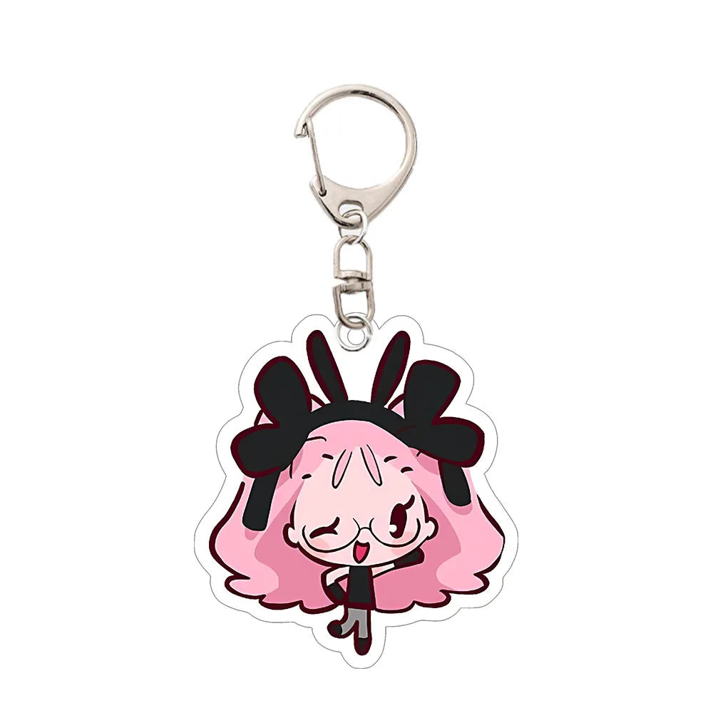 Acrylic keychain featuring a cute anime girl with pink hair and black accessories.