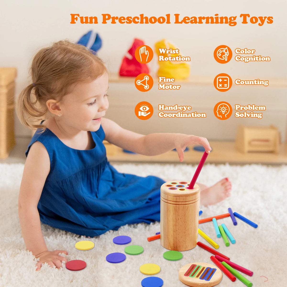 A young girl is playing with wooden toys including a coin, colored discs, and various wooden sticks on a white rug.