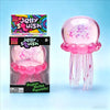 A box and toy of the Nee Doh Jelly Squish toy in pink with purple speckles, showing its squishy texture and dangling tentacle