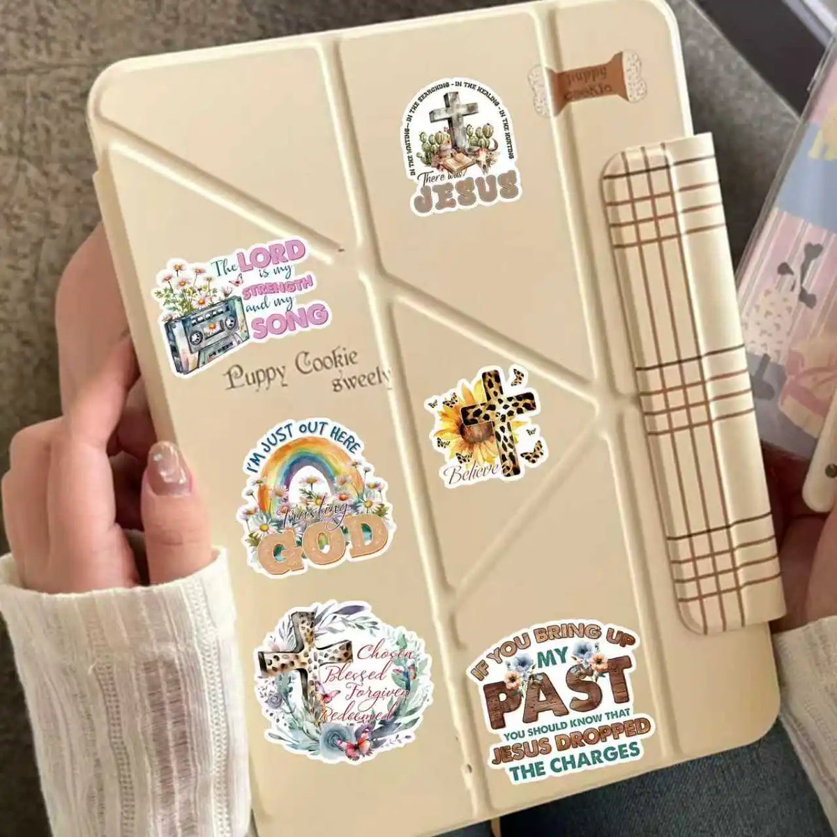 A beige sticker pack featuring various Christian verses and symbols for journaling and decor.
