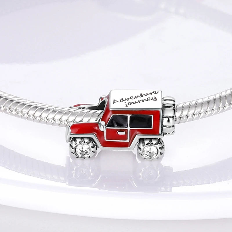 Sterling silver charm bead pendant shaped like a red pickup truck with an adventure journey plaque