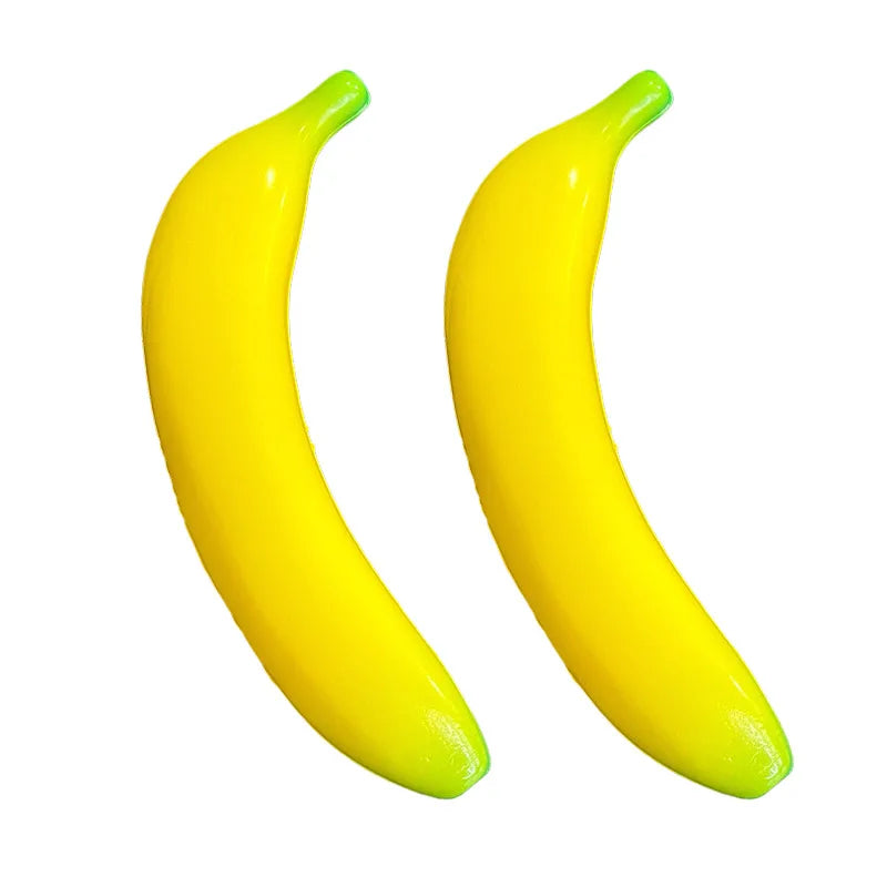Two bright yellow banana-shaped stress relief toys against a white background.