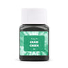 A small glass bottle of grass green textile fabric dye powder with a white cap.