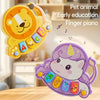 A yellow lion-shaped finger piano toy for early education and a purple cat-shaped finger piano toy.