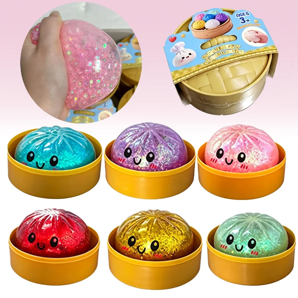 A collection of colorful glitter squishy toys shaped like dumplings in various colors and sizes.