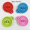 A set of five silicone funnels in various colors including red, blue, green, and pink.