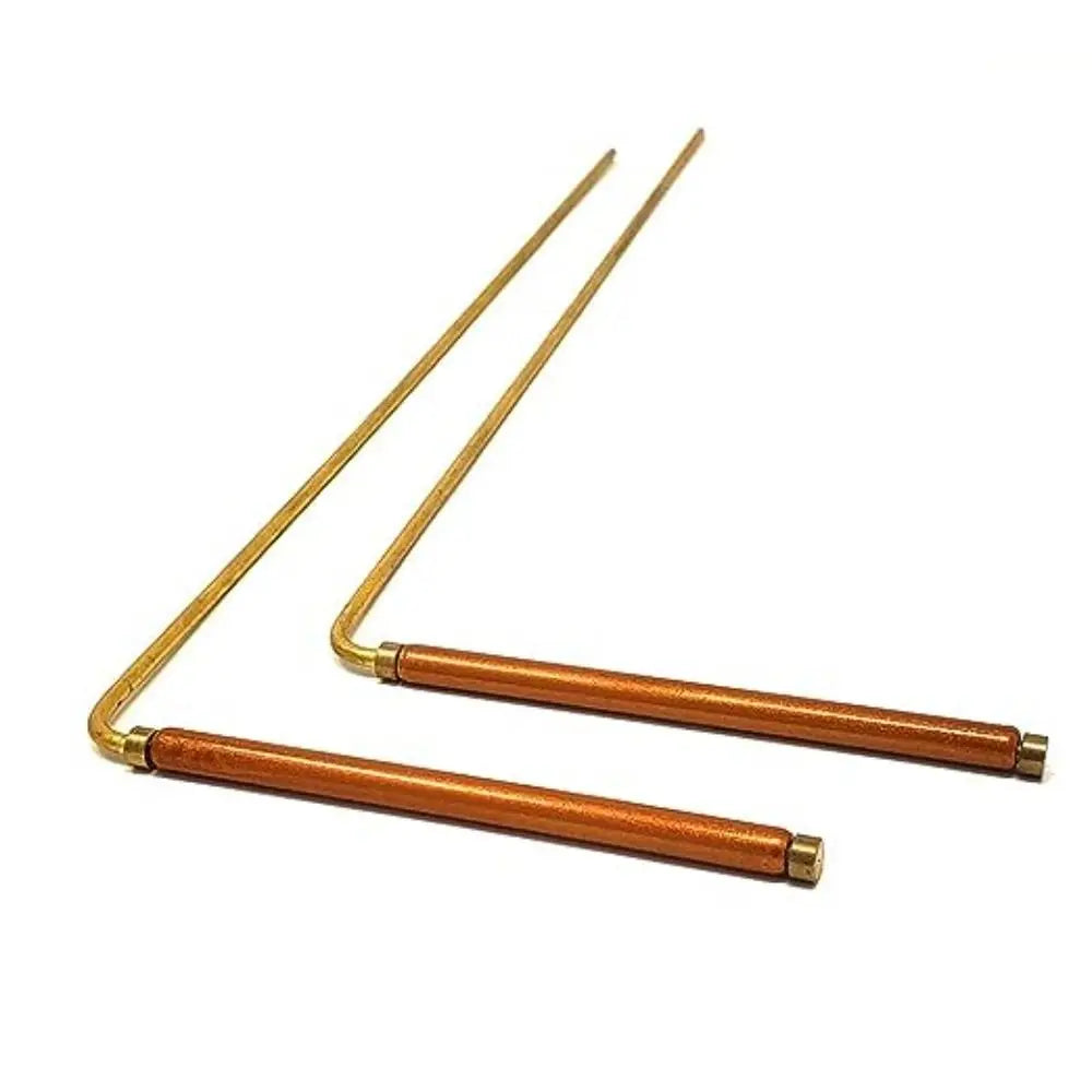 Two long, thin pure copper dowsing rods with brass tips.