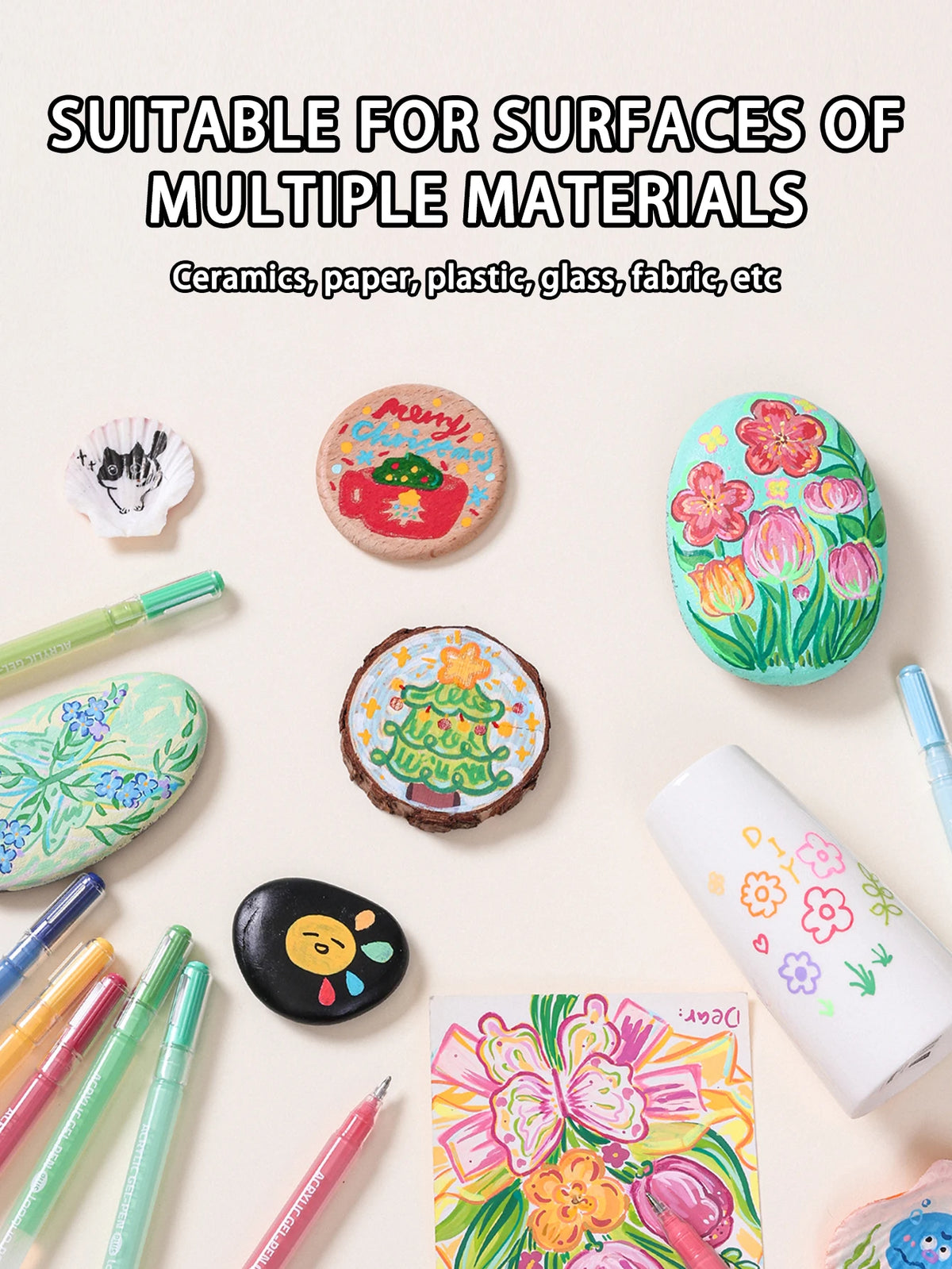A collection of multi-colored acrylic gel pens and drawing tools displayed on a light background.