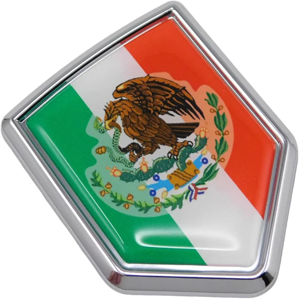 A chrome emblem featuring the flag of Mexico with an eagle and laurel wreath design.