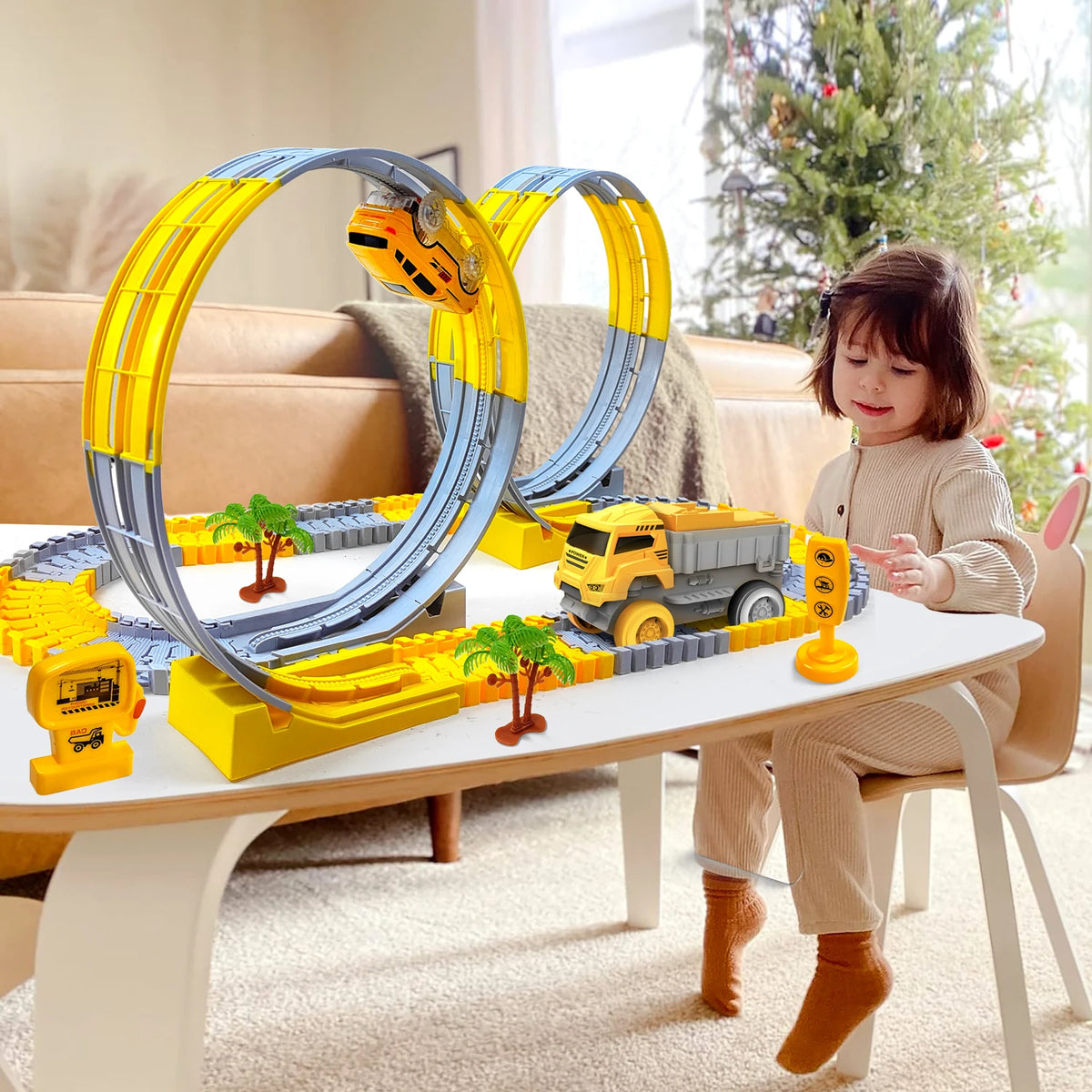 A child plays with a glow-in-the-dark LED race car track set featuring yellow and blue components.