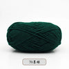 A ball of dark green pre-dyed milk cotton yarn, 70 skeins long.