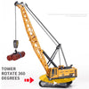 A yellow tower crane model rotates 360 degrees, lifting a brown truck.