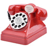 A vintage red rotary telephone piggy bank with a cutout saying Girlwill I miss you!