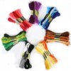 A set of multicolor embroidery floss skeins in various shades including pink, purple, blue, green, and orange.