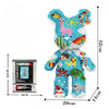 A colorful 3D bear building kit made of micro diamond blocks with pink and blue accents.