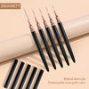 A set of five black metal ferrule nail art liner brushes with rose gold colored ferrules shown on a beige background.