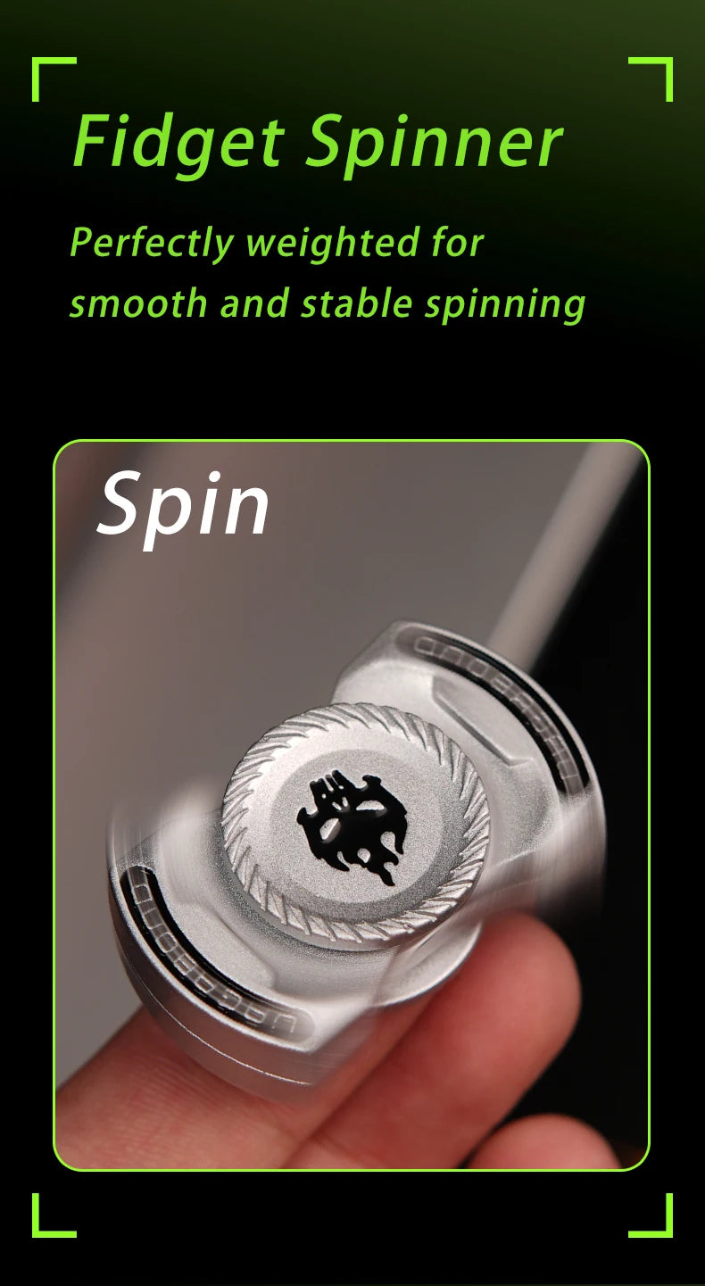 A close-up shot of a silver fidget spinner being held by a hand, showing the spinning mechanism.