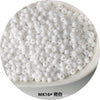 A pile of small, white, spherical electroplated metallic glass beads for jewelry and crafting.