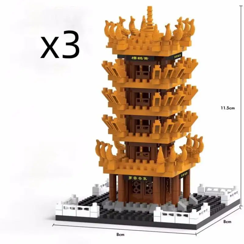 Three yellow crane tower micro building blocks set model kit with detailed architecture.