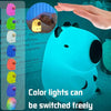 A bright blue silicone LED night light shaped like a unicorn is shown next to various color options.