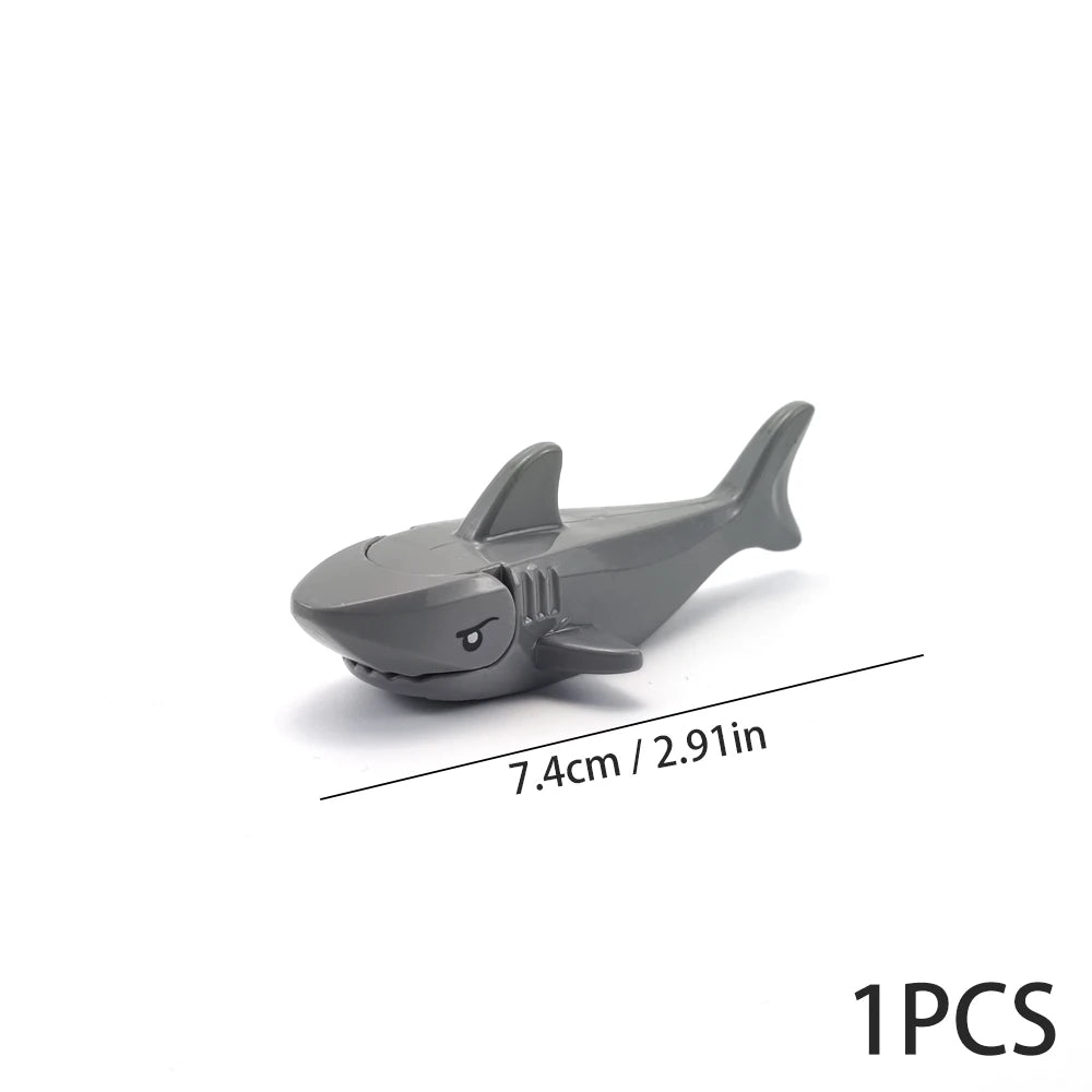 A gray plastic model of a marine creature, measuring 7.4cm long.