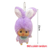 A fluffy purple bunny plush cartoon keychain charm with a white nose and ear tufts.
