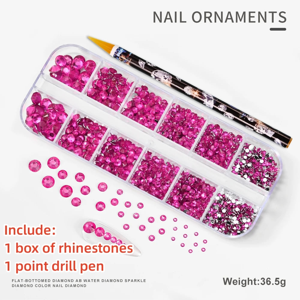 A box of pink rhinestones and a point drill pen for nail ornaments.
