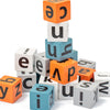 A stack of wooden letter blocks in orange and light blue colors for a spelling game.