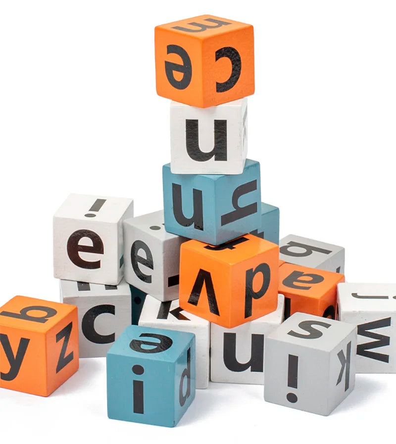 A stack of wooden letter blocks in orange and light blue colors for a spelling game.