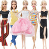 A set of handmade casual doll outfits featuring various tops and pants for 1/6 scale dolls.