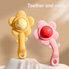 Two plastic teething rattles, one yellow and one pink, are displayed on a white surface.