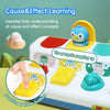 A white toy featuring various animal figures and buttons designed for cause and effect learning.