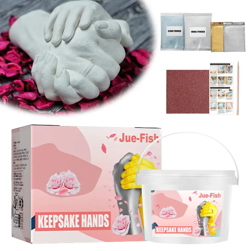 A box of Jue-Fish keepsake hands and feet, showing a molded hand print in pink and yellow tones.