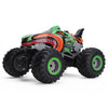 An orange and green All-Terrain RC Monster Truck with spray action features large tires and aggressive bodywork.