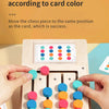 Hands move colored wooden chess pieces to match the color of cards in a puzzle game.