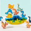 A set of wooden dinosaur stacking blocks in various colors and shapes arranged on a light blue background.