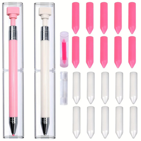 A set of pink and white diamond painting pens with refillable wax cores shown in a clear case.