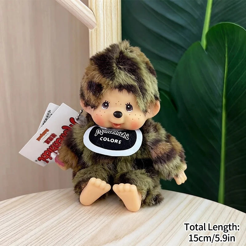 A fluffy brown and gray cartoon plush toy with a black collar and a small card next to it.