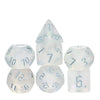 A set of seven translucent glitter polyhedral dice, including a pyramid and various polyhedra shapes.